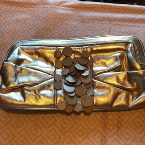 Funky gold Rinaldi clutch, snap shit, clean inside, great for graduation